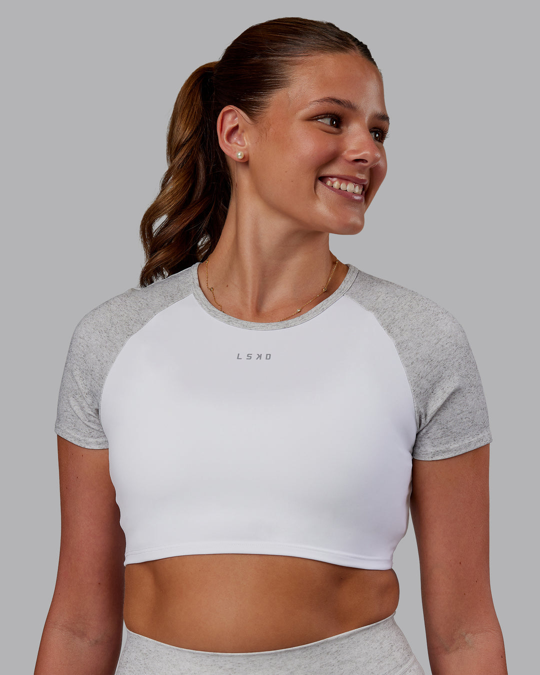 Woman wearing Run With It Ultra Cropped Tee - White-Grey Marl | Model:Phoebe | Size:S - view 4