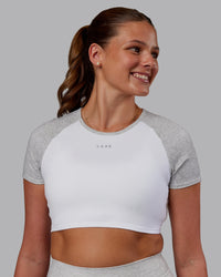 Woman wearing Run With It Ultra Cropped Tee - White-Grey Marl | Model:Phoebe | Size:S | Thumbnail Index: 3