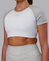 Woman wearing Run With It Ultra Cropped Tee - White-Grey Marl | Model:Phoebe | Size:S | Thumbnail Index: 5