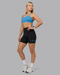 Woman wearing Rush Sports Bra - Azure Blue | Model:Halle | Size:S | Thumbnail Index: 3