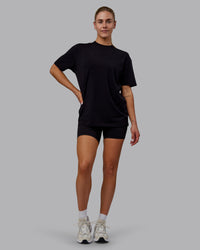 Woman wearing Sara GET ÆTLA SKAL Unisex FLXCotton Tee Oversize - Black-White | Thumbnail Index: 11
