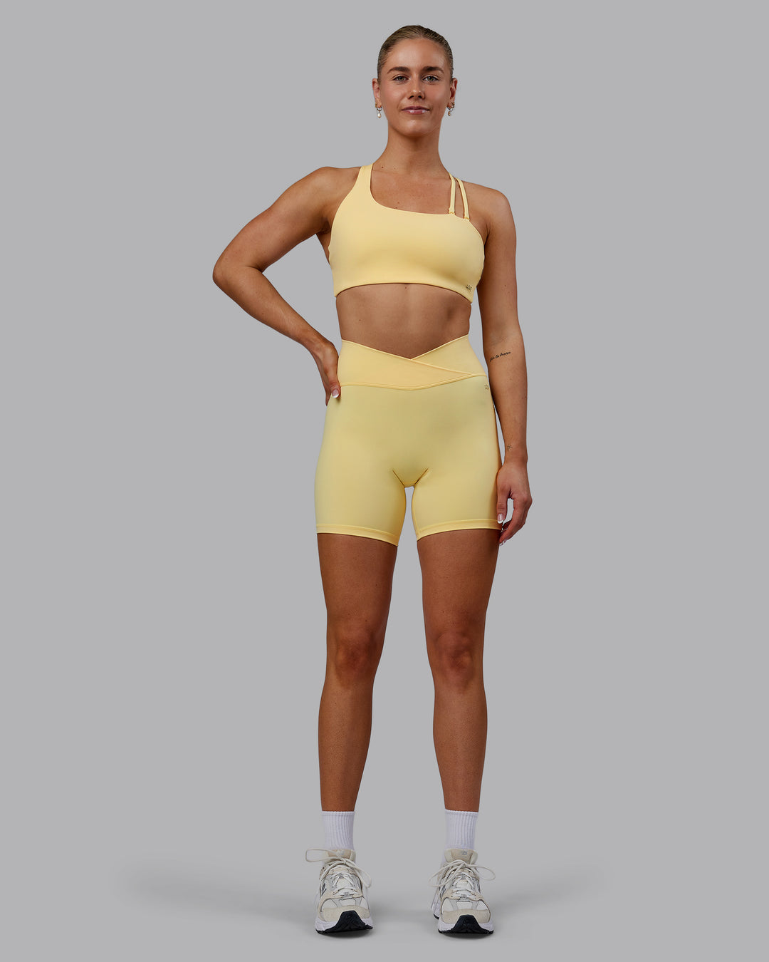 Woman wearing Sara Helios Sports Bra - Sunflower - view 8