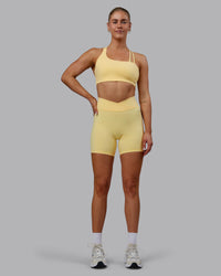 Woman wearing Sara Helios Sports Bra - Sunflower | Thumbnail Index: 7