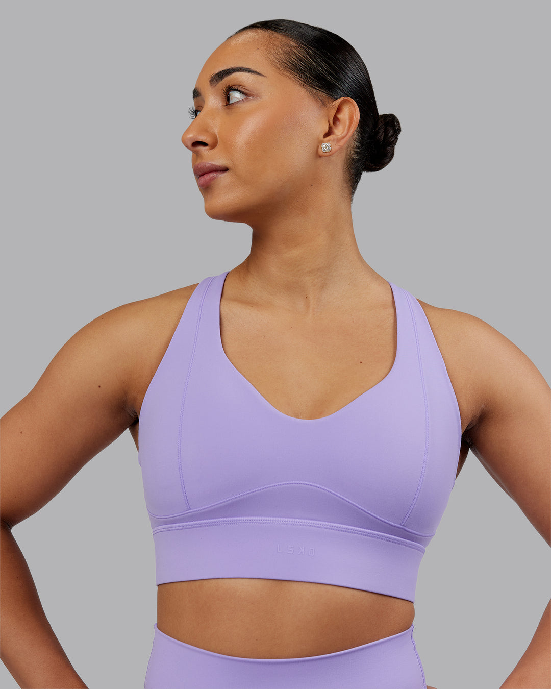 Woman wearing Sculpt Sports Bra - Violet Ray | Model:Ayla | Size:S - view 3