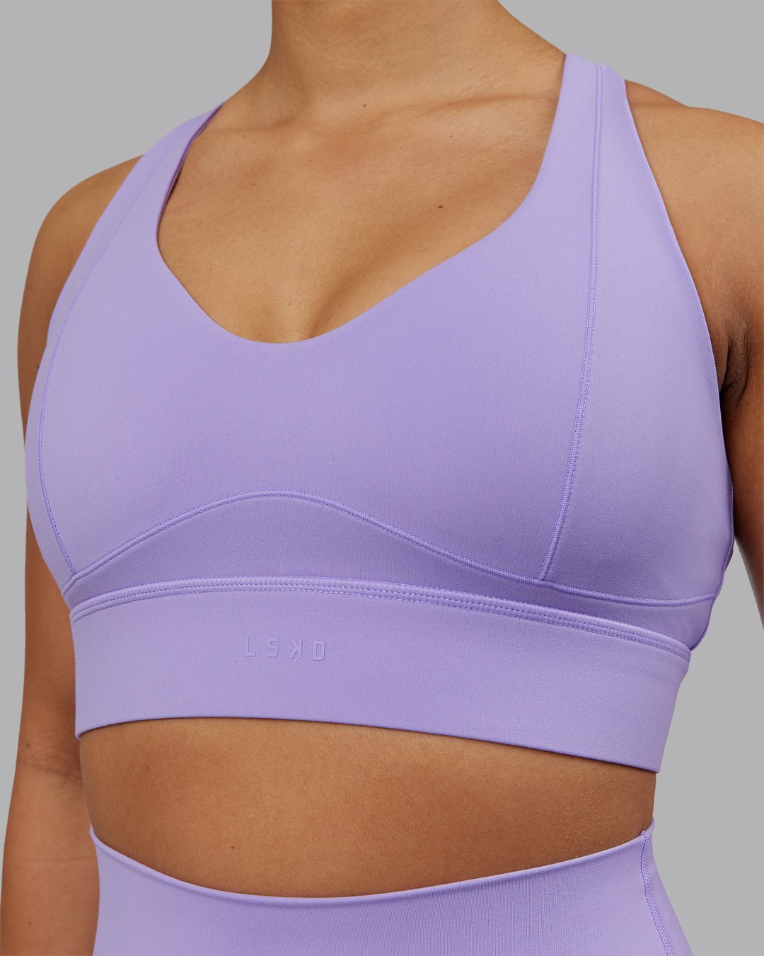 Woman wearing Sculpt Sports Bra - Violet Ray | Model:Ayla | Size:S - view 7