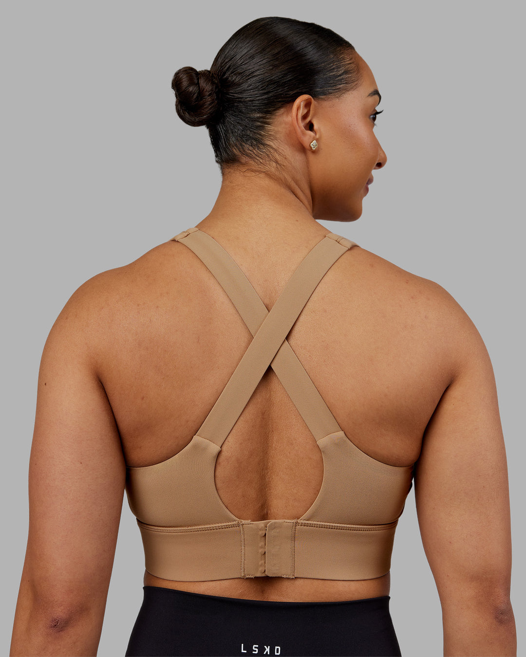 Woman wearing Sculpt Sports Bra - Warm Smoke| Model:Ayla | Size:S - view 2