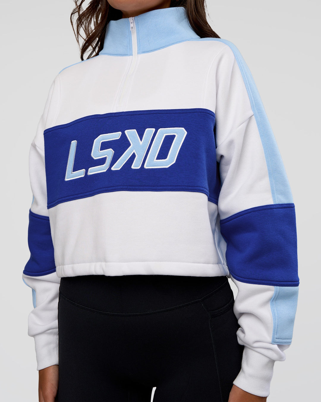 Woman wearing Slam Quarter Zip Sweater - White-Electric Indigo | Model:Kirstyn | Size:S - view 5