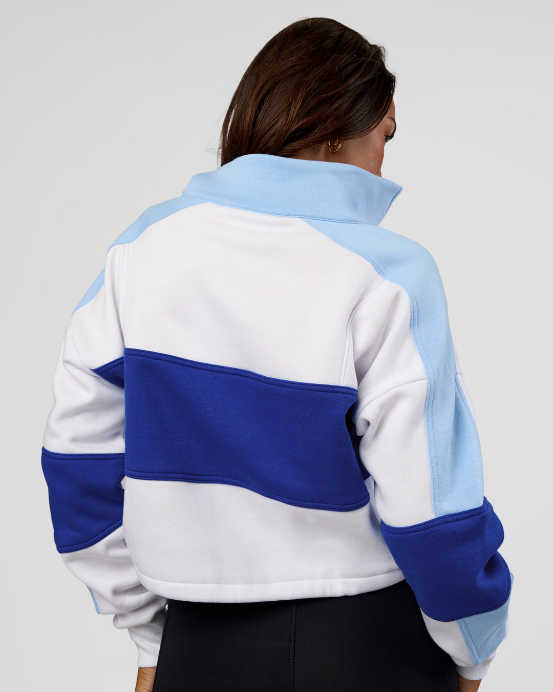 Woman wearing Slam Quarter Zip Sweater - White-Electric Indigo | Model:Kirstyn | Size:S - view 3