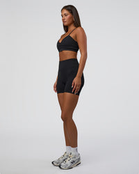 Woman wearing Spark Seamless Sports Bra - Black | Model:Bianca | Size:S | Thumbnail Index: 7