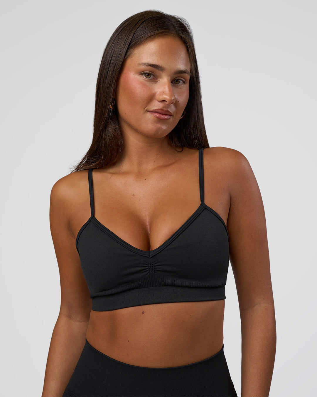 Woman wearing Spark Seamless Sports Bra - Black | Model:Bianca | Size:S - view 6