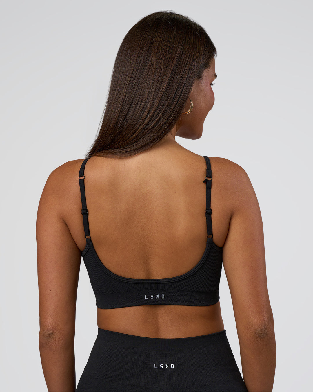 Woman wearing Spark Seamless Sports Bra - Black | Model:Bianca | Size:S - view 4