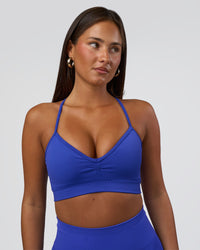 Woman wearing Spark Seamless Sports Bra - Power Cobalt | Model:Bianca | Size:S | Thumbnail Index: 0