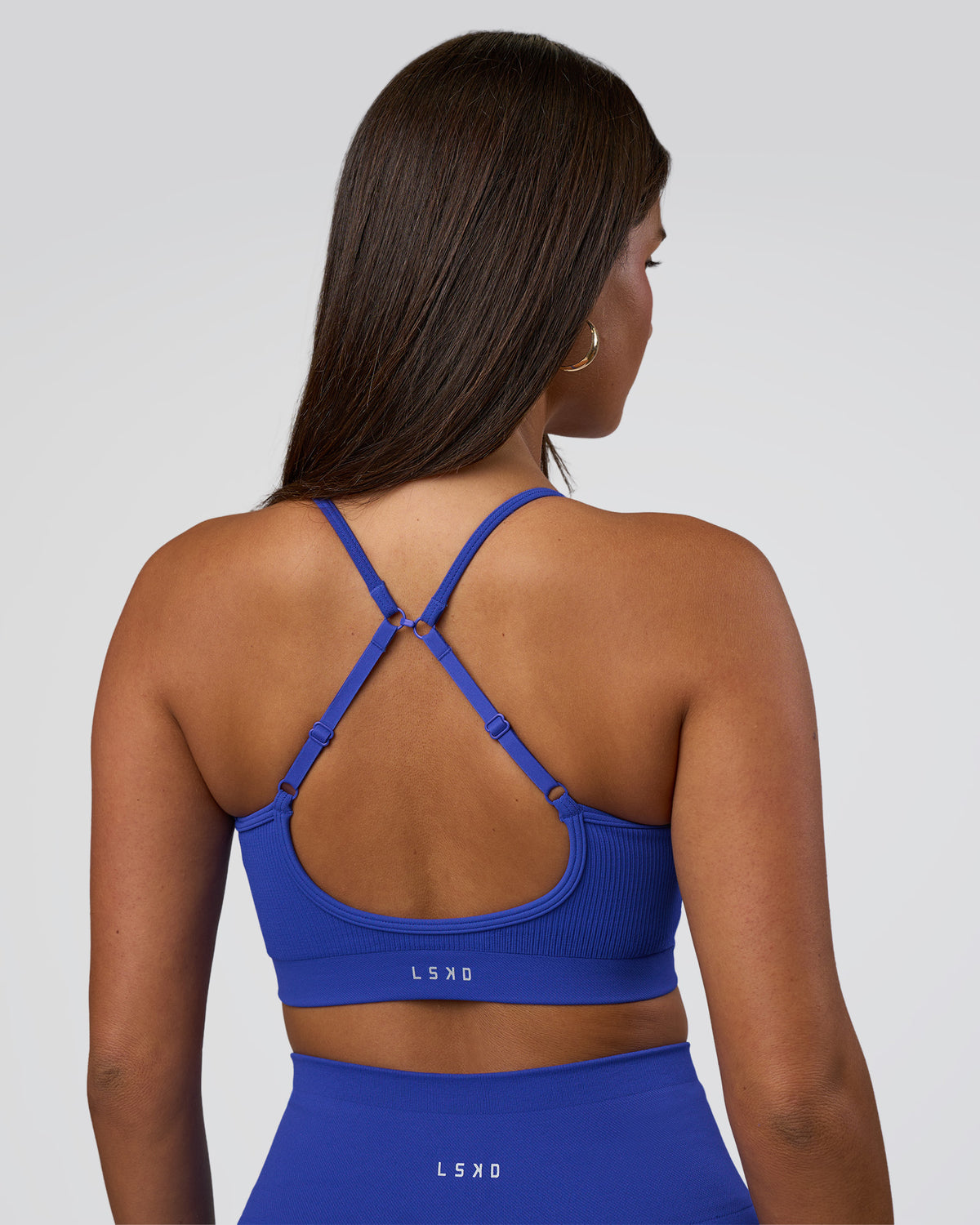 Woman wearing Spark Seamless Sports Bra - Power Cobalt | Model:Bianca | Size:S