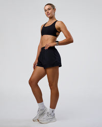 Woman wearing Sport Short 2.5" - Black | Model:Emelia | Size:S | Thumbnail Index: 4