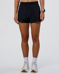 Woman wearing Sport Short 2.5" - Black | Model:Emelia | Size:S | Thumbnail Index: 2