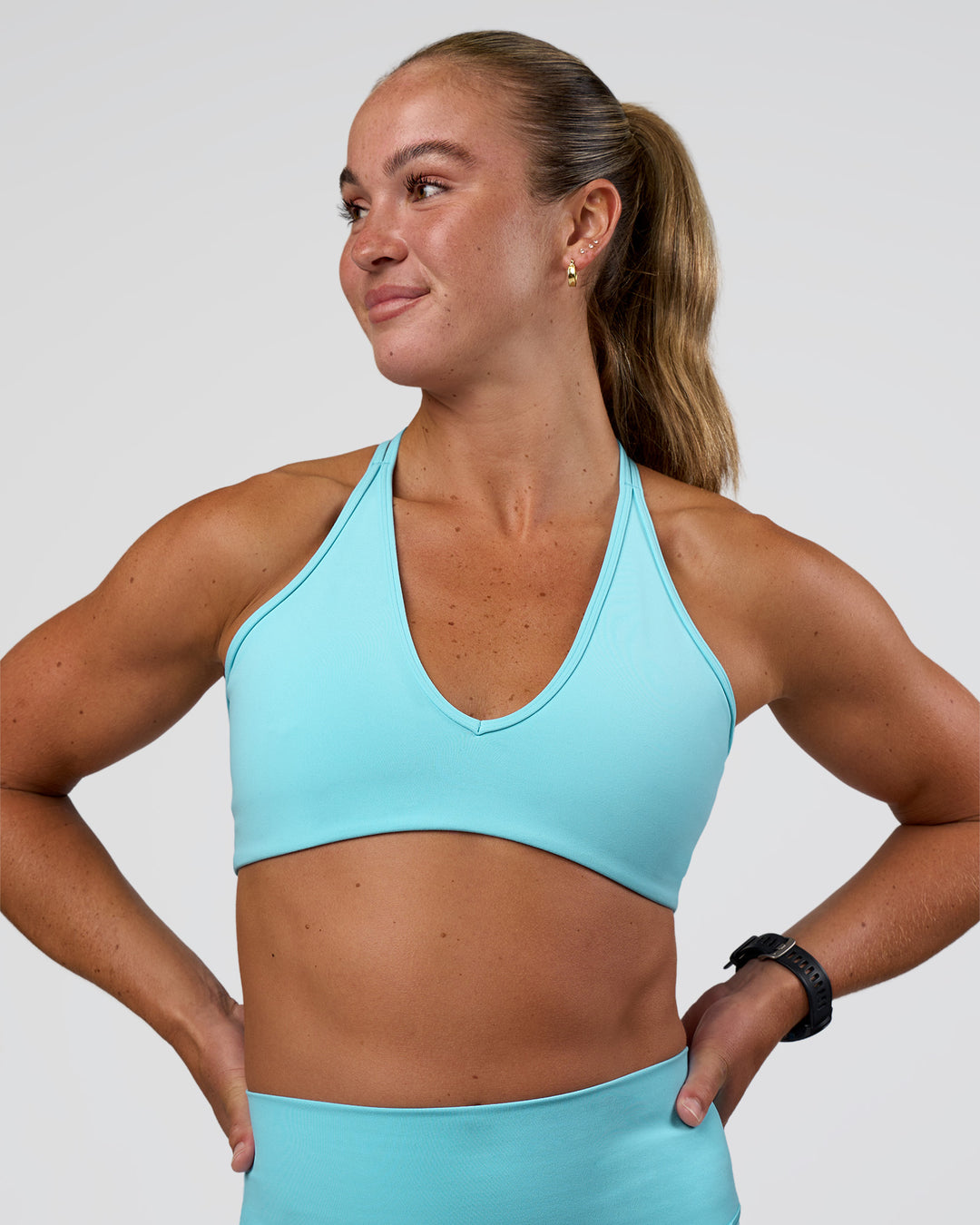 Woman wearing Stamina Pulse Sports Bra - Baltic Sea | Model:Sav | Size:S - view 3