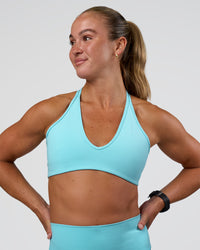 Woman wearing Stamina Pulse Sports Bra - Baltic Sea | Model:Sav | Size:S | Thumbnail Index: 2