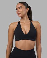 Woman wearing Stamina Pulse Sports Bra - Black | Model:Rhiley | Size:S | Thumbnail Index: 1