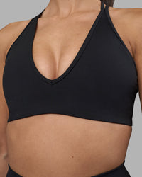 Woman wearing Stamina Pulse Sports Bra - Black | Model:Rhiley | Size:S | Thumbnail Index: 4