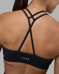 Woman wearing Stamina Pulse Sports Bra - Black | Model:Rhiley | Size:S | Thumbnail Index: 0
