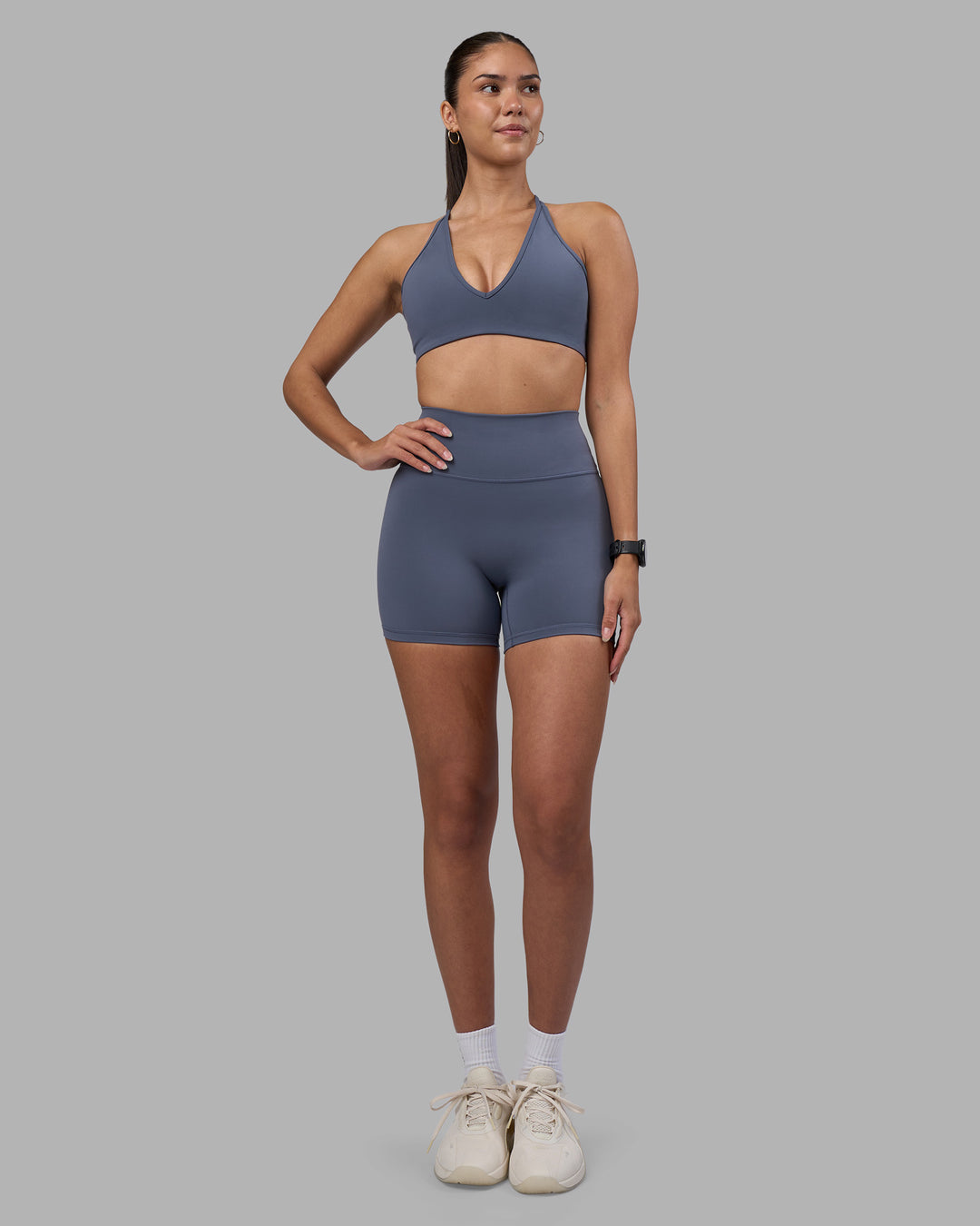 Woman wearing Stamina Pulse Sports Bra - Night Shadow | Model:Rhiley | Size:S - view 5