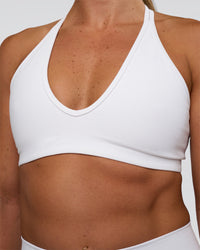 Woman wearing Stamina Pulse Sports Bra - White | Model:Sav | Size:S | Thumbnail Index: 3