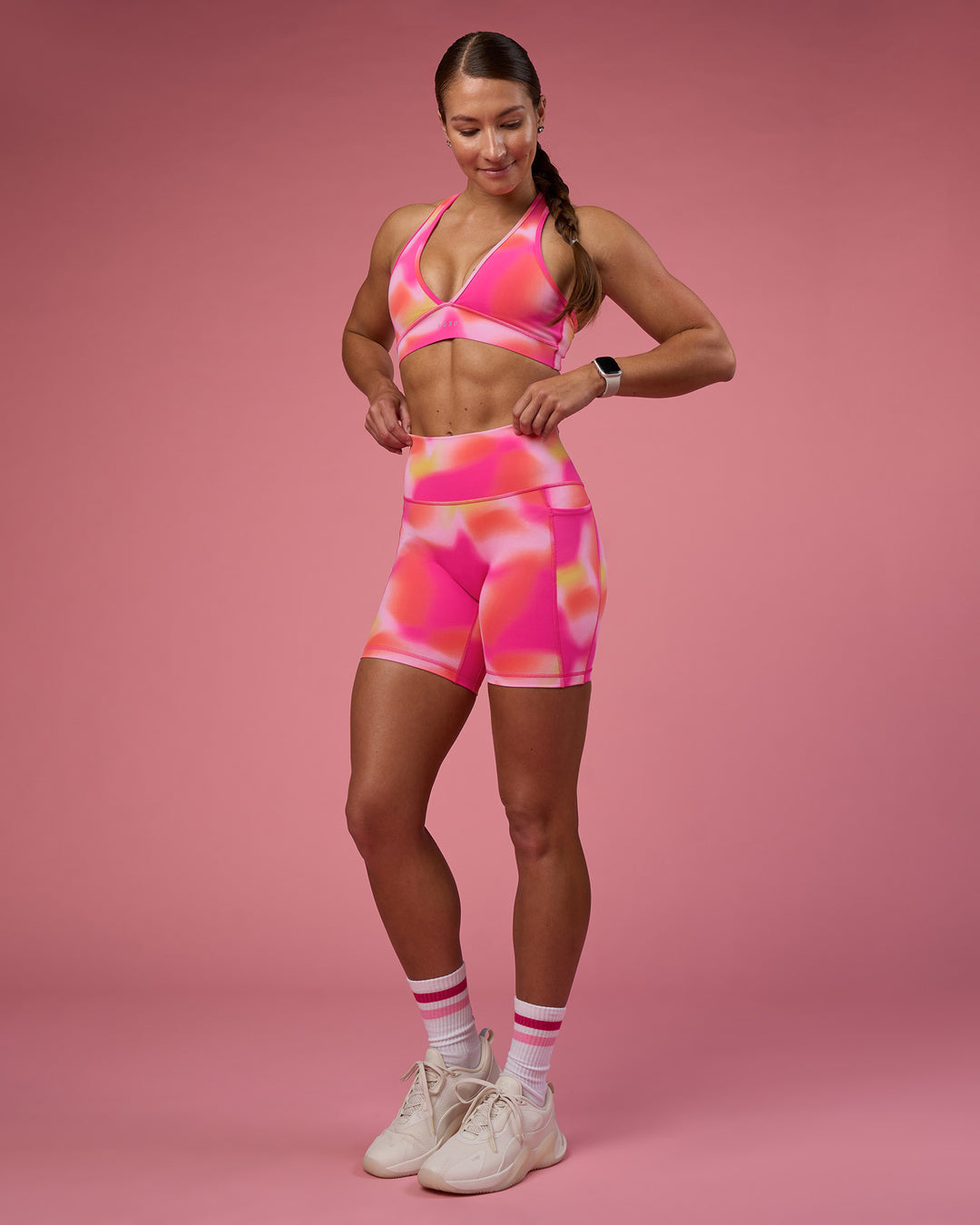 Woman wearing Stamina Rise Sports Bra - Pink Glow Print | Model:Hannah | Size:S - view 3