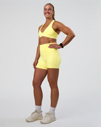 Woman wearing Stamina Rise Sports Bra - Yellow Fizz | Model:Sav | Size:S | Thumbnail Index: 4