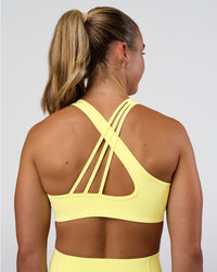 Woman wearing Stamina Rise Sports Bra - Yellow Fizz | Model:Sav | Size:S | Thumbnail Index: 5