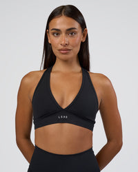 Woman wearing Stamina Sports Bra - Black | Set:true | Angle:front | Model:Ruby | Size:S | Thumbnail Index: 2