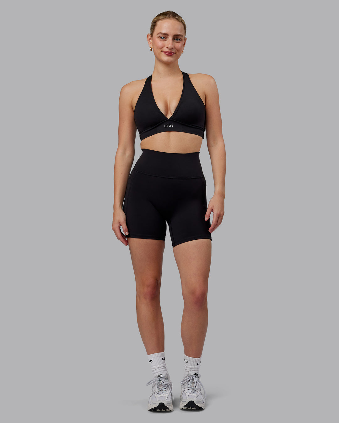 Woman wearing Stamina Sports Bra (D/DD/E) - Black - view 8
