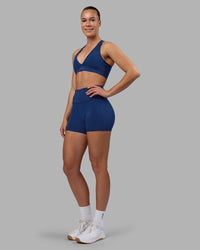 Woman wearing Stamina Sports Bra - Midnight Blue | Model:Charlize | Size:S | Thumbnail Index: 2