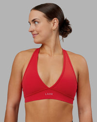 Woman wearing Stamina Sports Bra - Scarlet | Set:true | Angle:front | Model:Keisha | Size:S | Thumbnail Index: 5