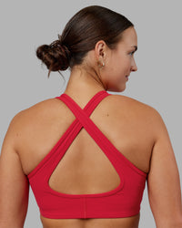 Woman wearing Stamina Sports Bra - Scarlet | Set:true | Angle:back | Model:Keisha | Size:S | Thumbnail Index: 3