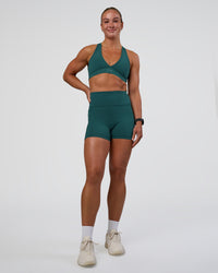 Woman wearing Stamina Sports Bra - Transformative Teal | Model:Sav | Size:S | Thumbnail Index: 2