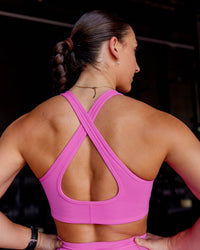 Woman wearing Stamina Sports Bra - Ultra Fuchsia | Model:Summer | Size:S | Thumbnail Index: 1
