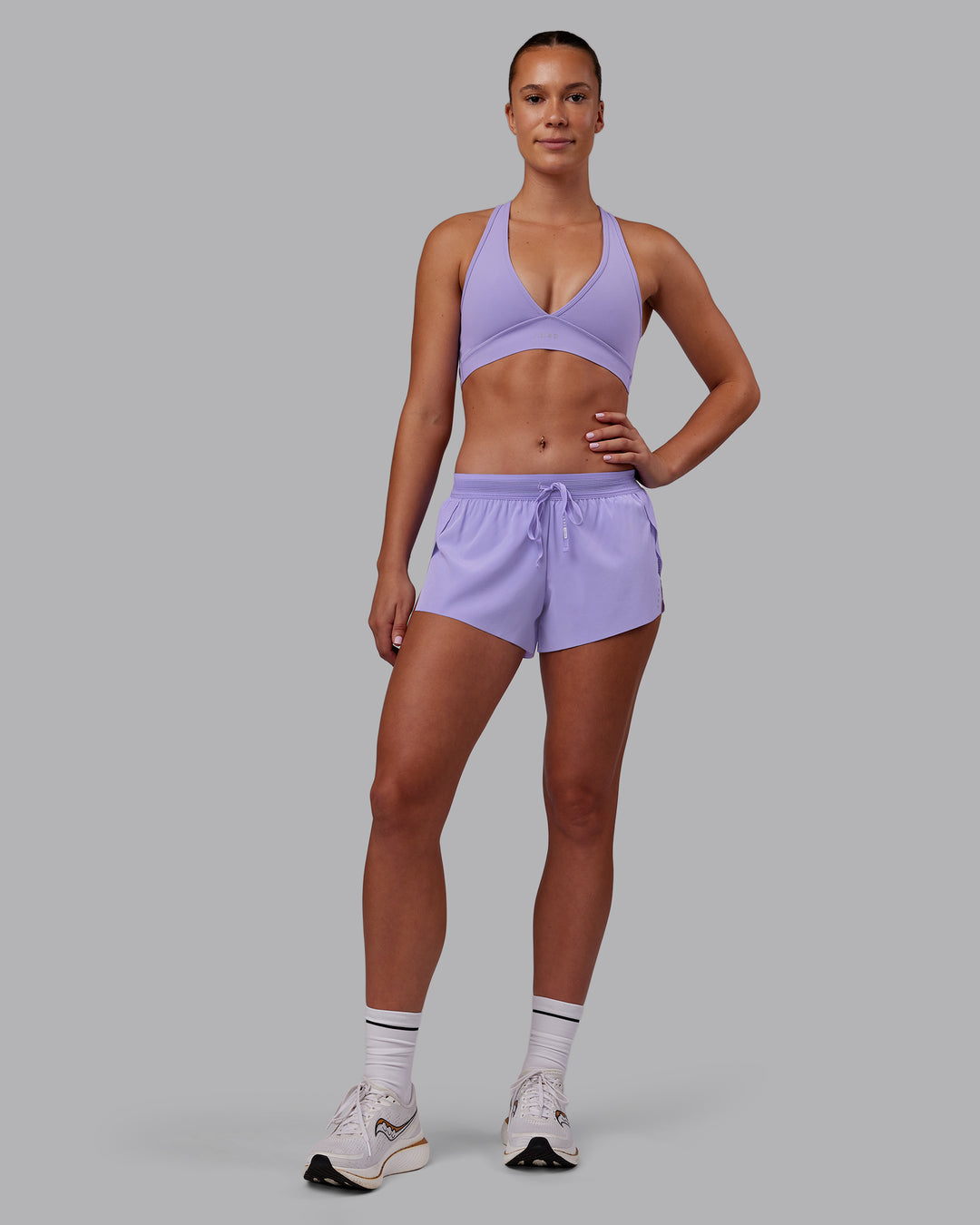 Woman wearing Stamina Sports Bra - Violet Ray | Model:Charlize | Size:S - view 5