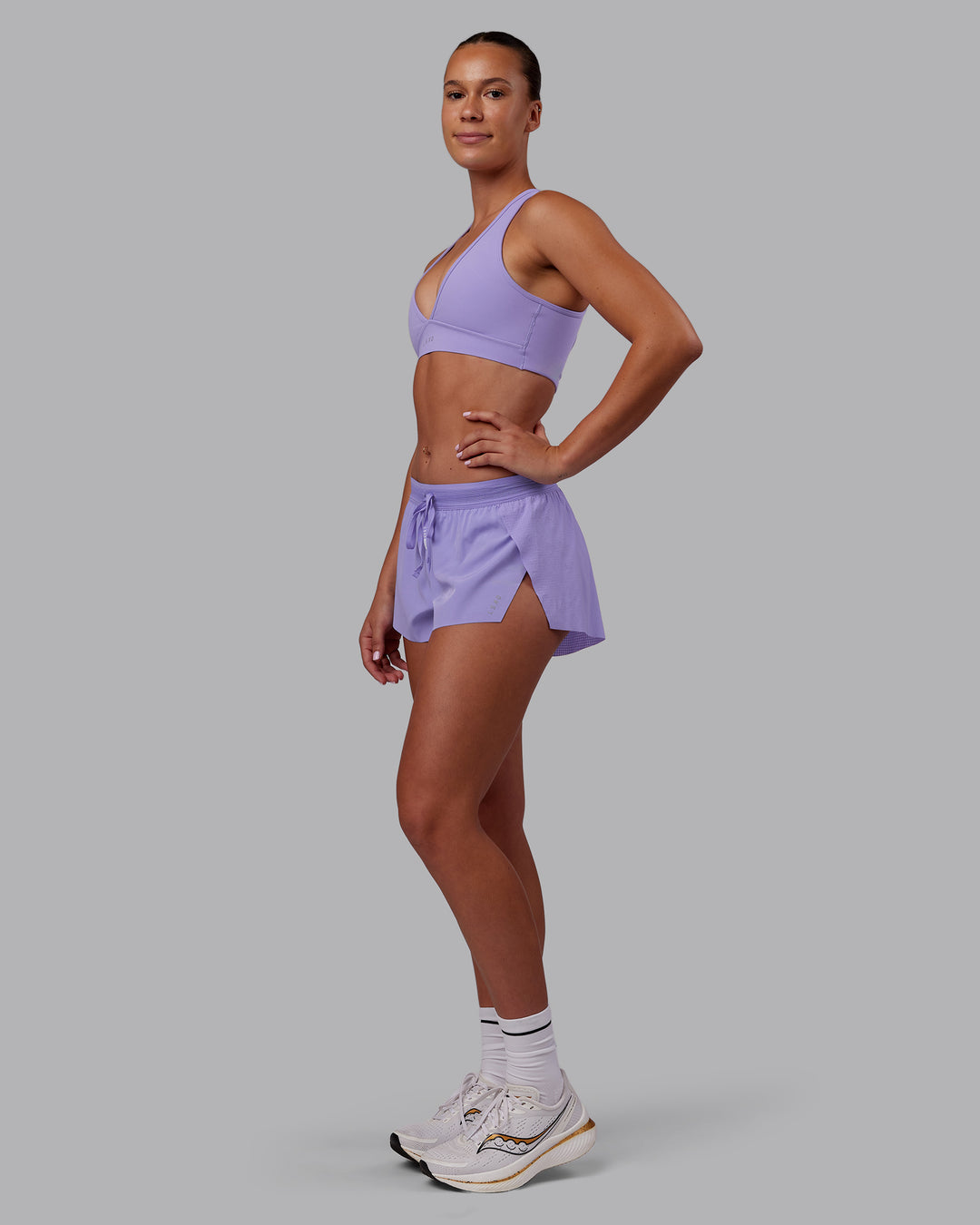 Woman wearing Stamina Sports Bra - Violet Ray | Model:Charlize | Size:S - view 3