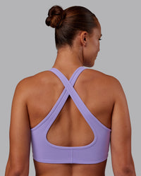 Woman wearing Stamina Sports Bra - Violet Ray | Model:Charlize | Size:S | Thumbnail Index: 1
