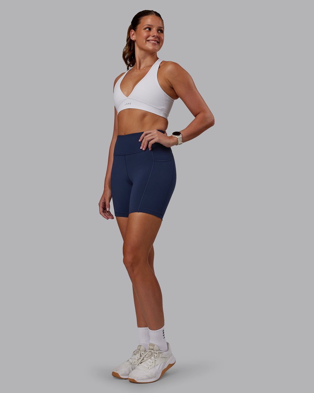 Woman wearing Stamina Sports Bra - White | Model:Phoebe | Size:S - view 3