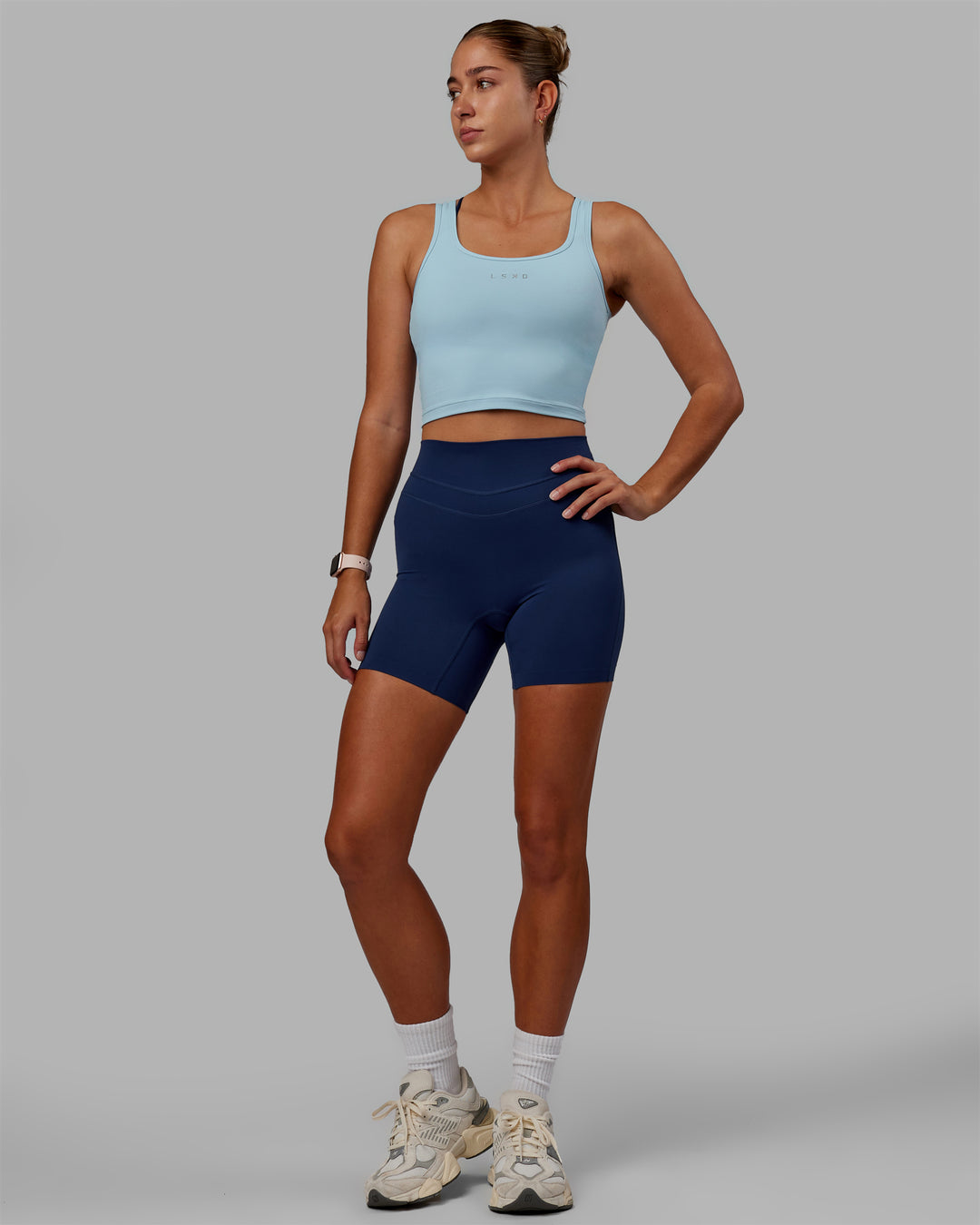 Woman wearing Staple Active Cropped Tank - Glacial Blue - view 6