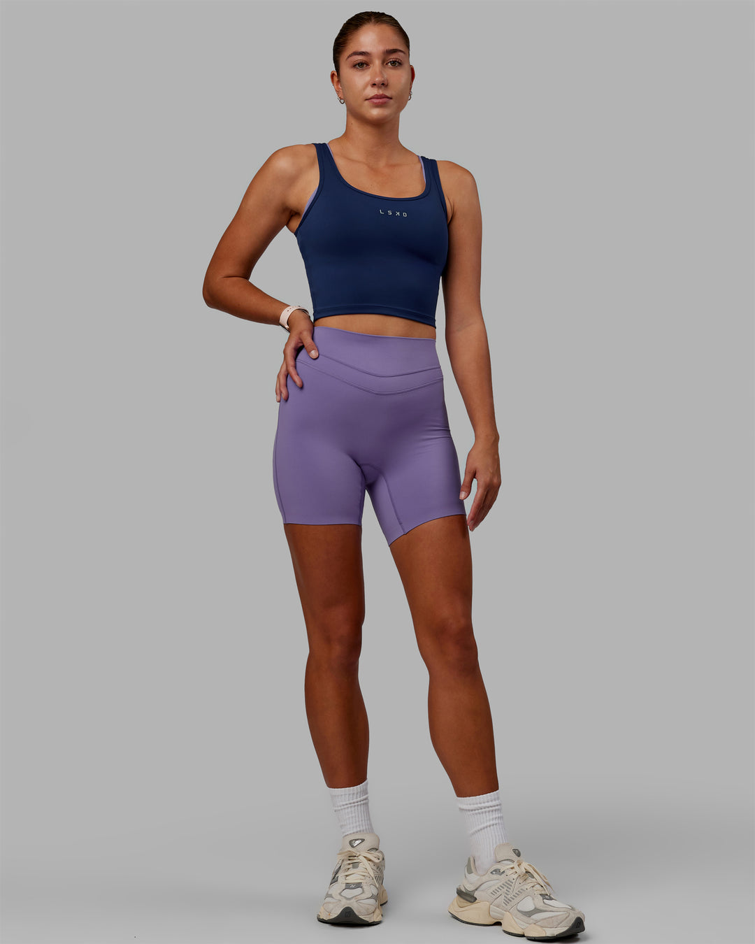 Woman wearing Staple Active Cropped Tank - Midnight Blue - view 5