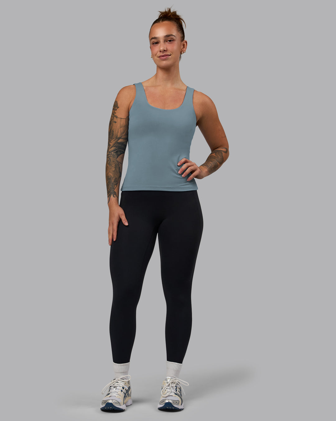 Woman wearing Staple Active Shelf Bra Tank - Elemental Blue - view 5