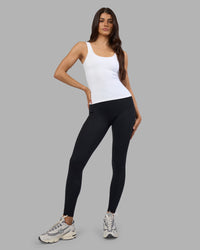 Woman wearing Staple Active Shelf Bra Tank - White | Model:Phoebe | Size:S | Thumbnail Index: 3