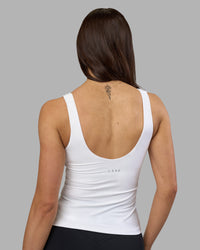 Woman wearing Staple Active Shelf Bra Tank - White | Model:Phoebe | Size:S | Thumbnail Index: 2