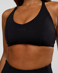 Woman wearing Stellar Sports Bra - Black | Model:Kirstyn | Size:S | Thumbnail Index: 3