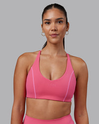 Woman wearing Stellar Sports Bra - Hot Pink | Model:Rhiley | Size:S | Thumbnail Index: 2