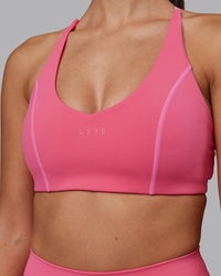 Woman wearing Stellar Sports Bra - Hot Pink | Model:Rhiley | Size:S | Thumbnail Index: 6