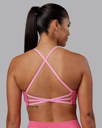 Woman wearing Stellar Sports Bra - Hot Pink | Model:Rhiley | Size:S | Thumbnail Index: 1