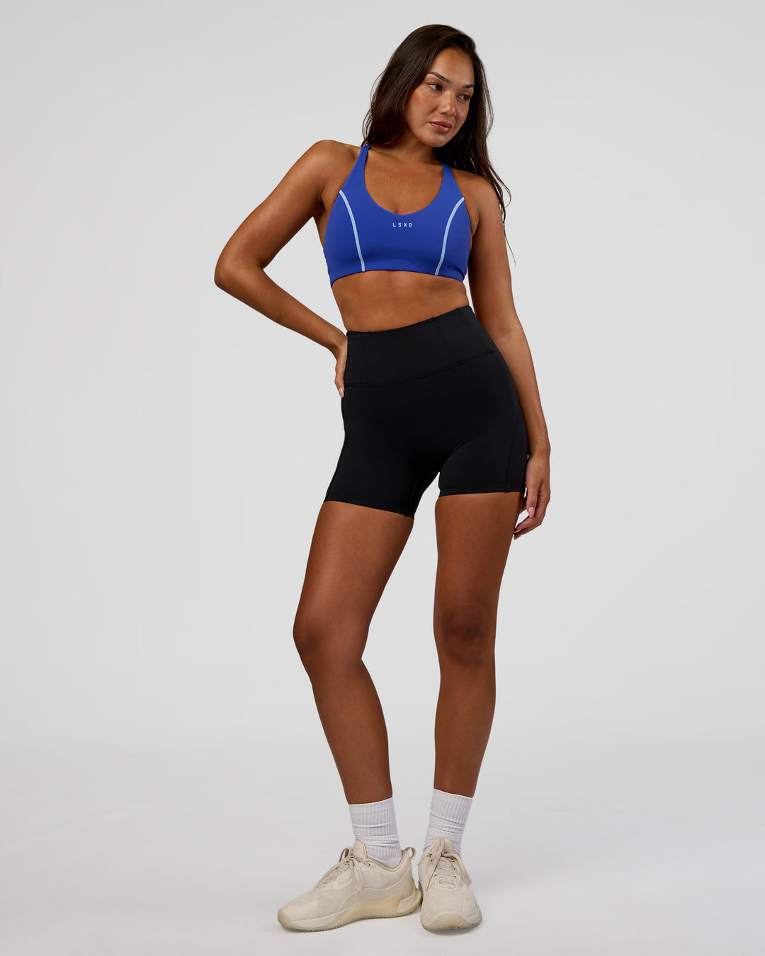 Woman wearing Stellar Sports Bra - Power Cobalt | Model:Kirstyn | Size:S - view 6